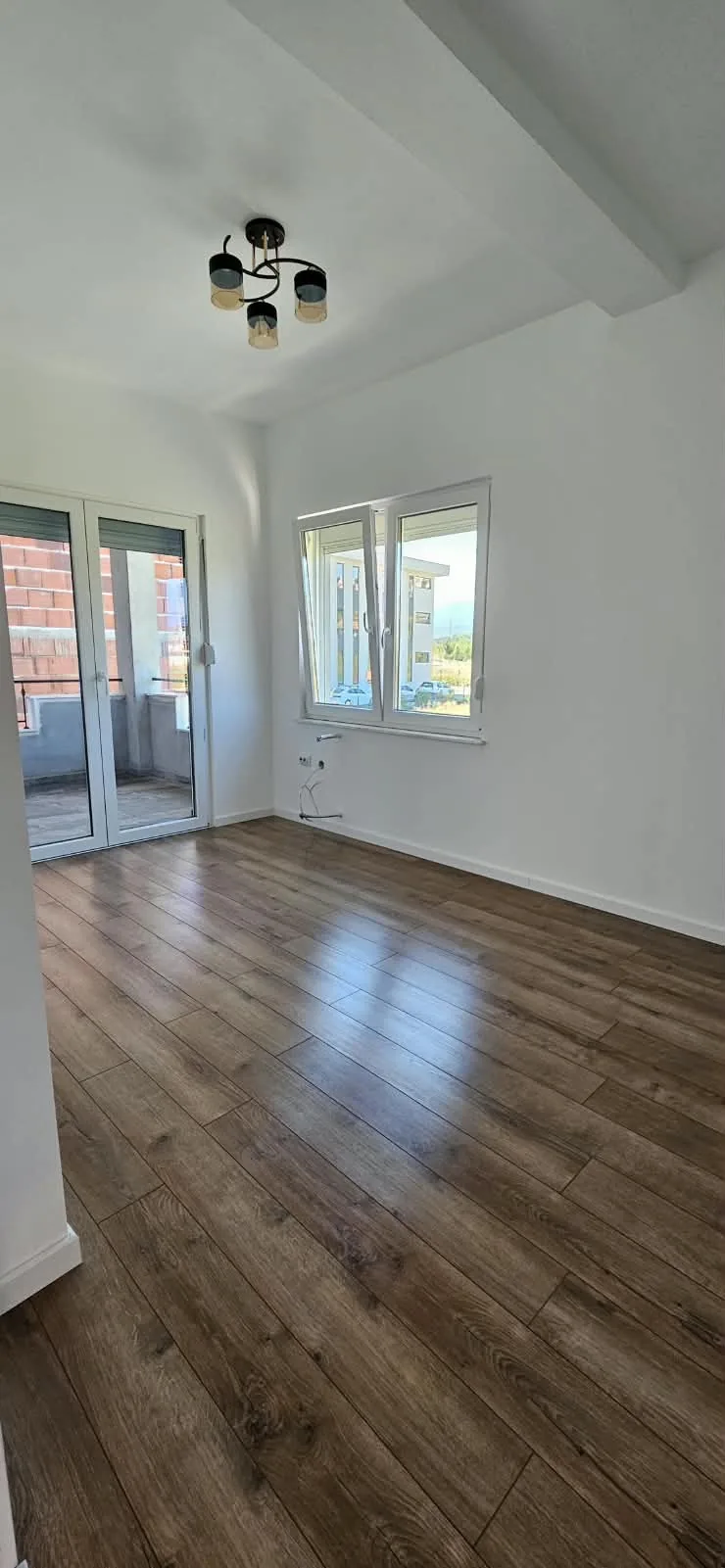 Schlafzimmer mit Terrassentüren